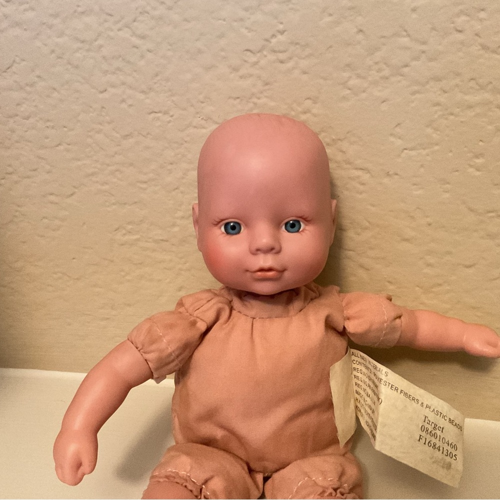 Adorable Baby Doll with Blue Eyes